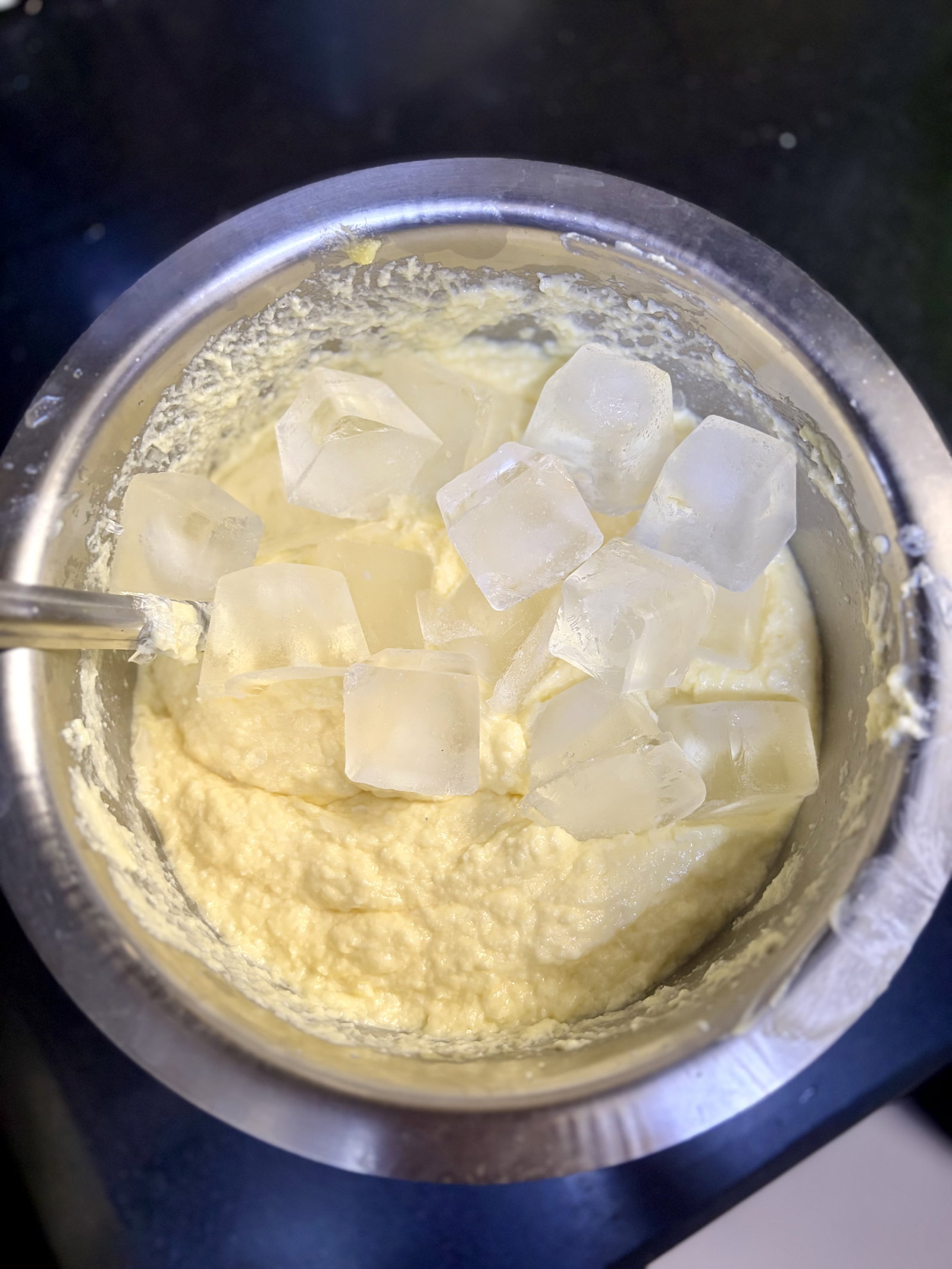 Step 2.1: Drop in ice cubes while churning