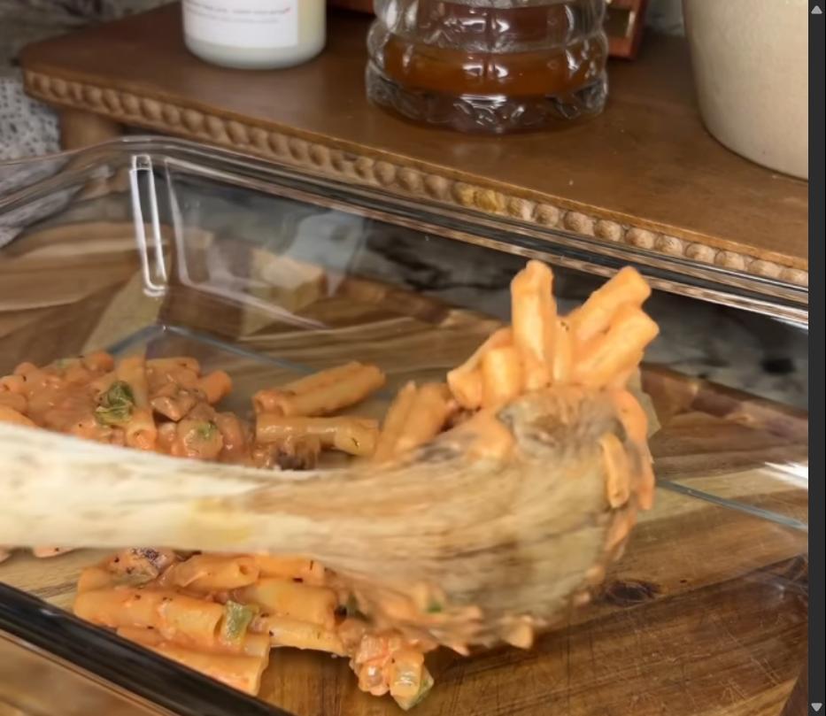 Step 1.1: Spoon half of the noodle mixture into the bottom of a casserole dish or 9x13 glass pan