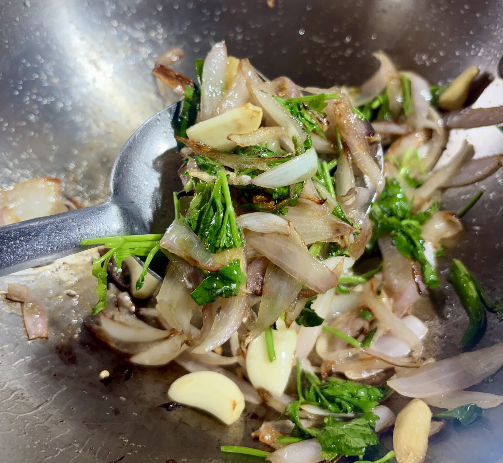 Step 2.1: Stir in the fresh coriander leaves and tender stalks