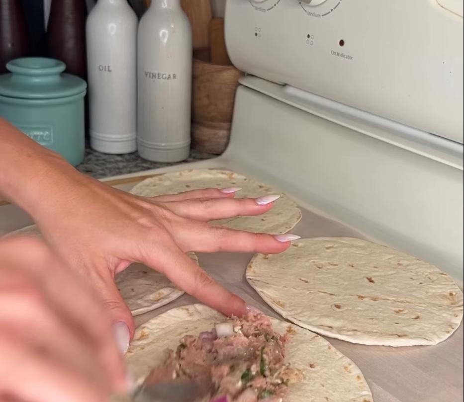 Step 2.1: Spread the turkey mixture onto one side of the flour tortillas