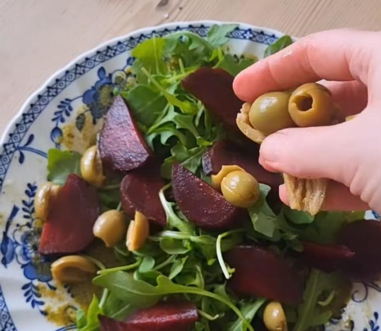 Step 1.1: Add halved olives