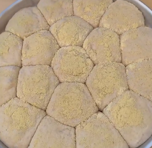 Step 1.1: Form the dough into balls (around 70g each), coating them well with corn flour to prevent sticking