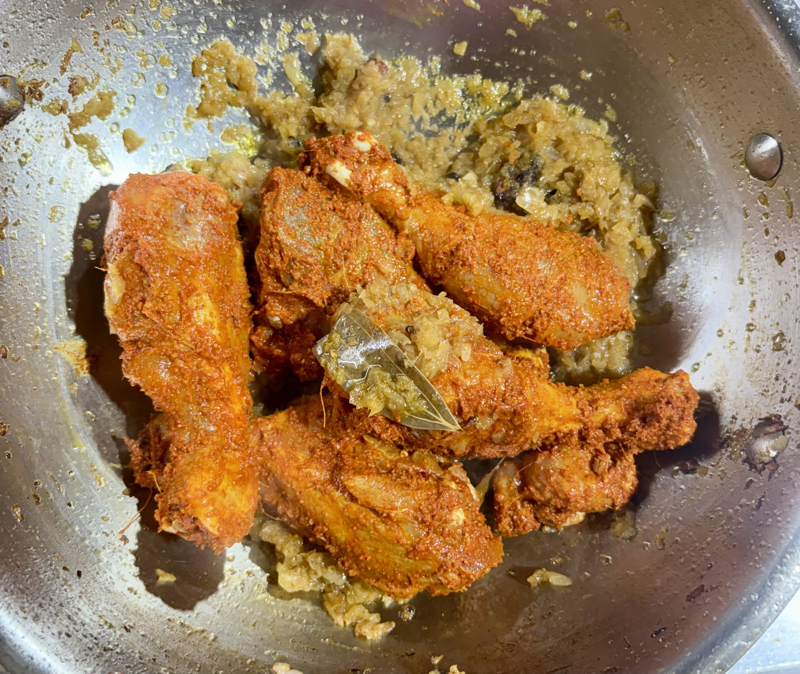 Step 3.1: Add the marinated chicken and stir-fry for 2-3 minutes to coat it in the spices