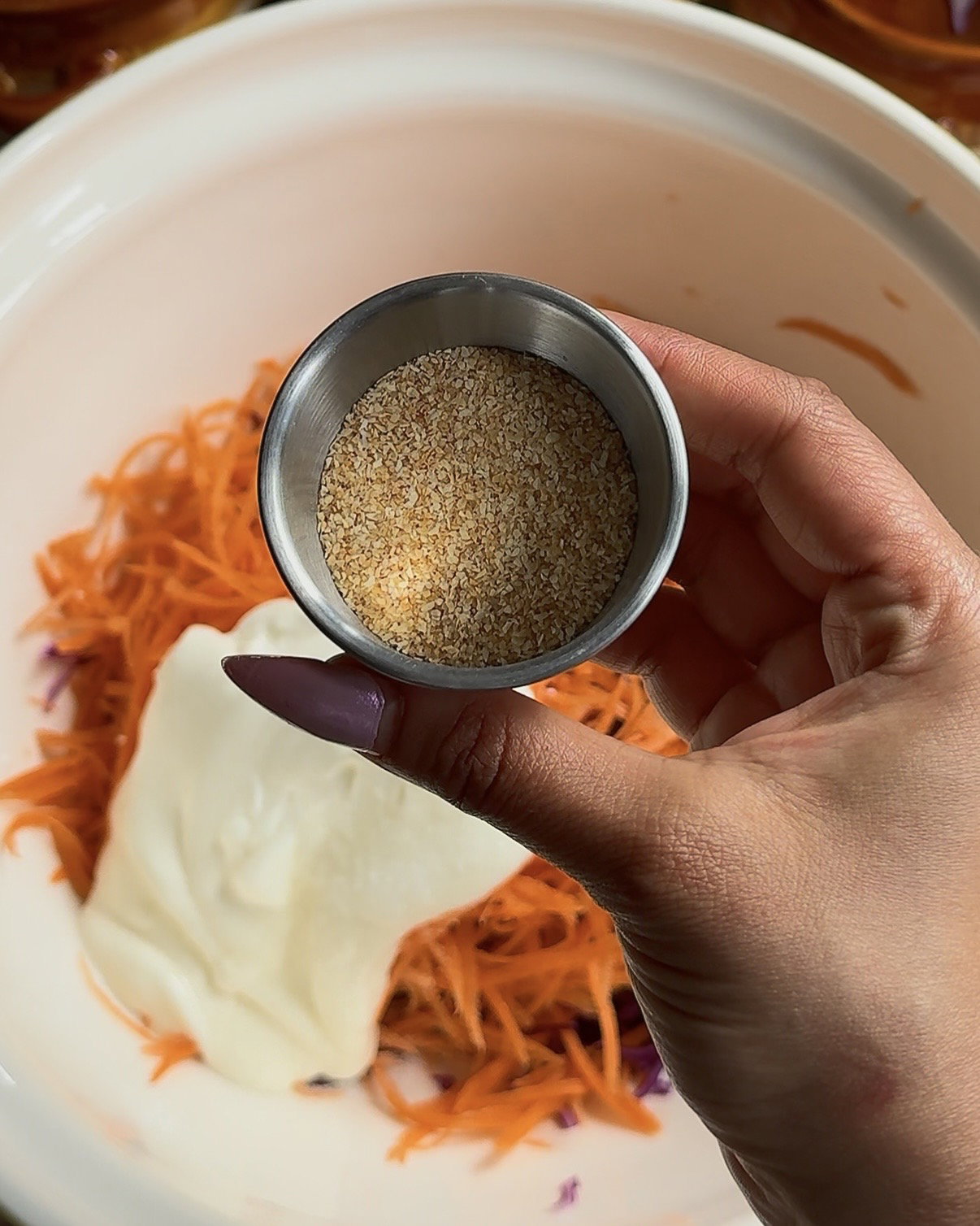 Step 2.4: Mix purple cabbage, carrots, sour cream, garlic granules, chives, and salt in a bowl until combined
