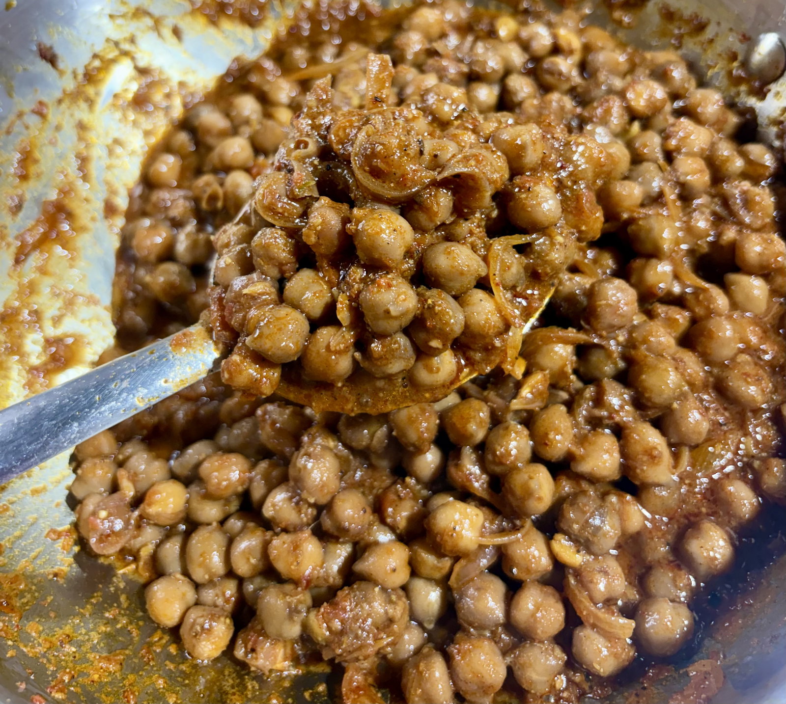 Step 2.2: Add boiled channa and sauté for 1–2 minutes over high heat