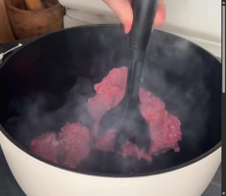 Step 1.1: Brown ground beef in a large pot, breaking it apart until no longer pink