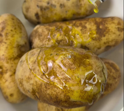 Step 1.1: Drizzle the potatoes with olive oil, sprinkle generously with salt, and place them directly on the oven rack