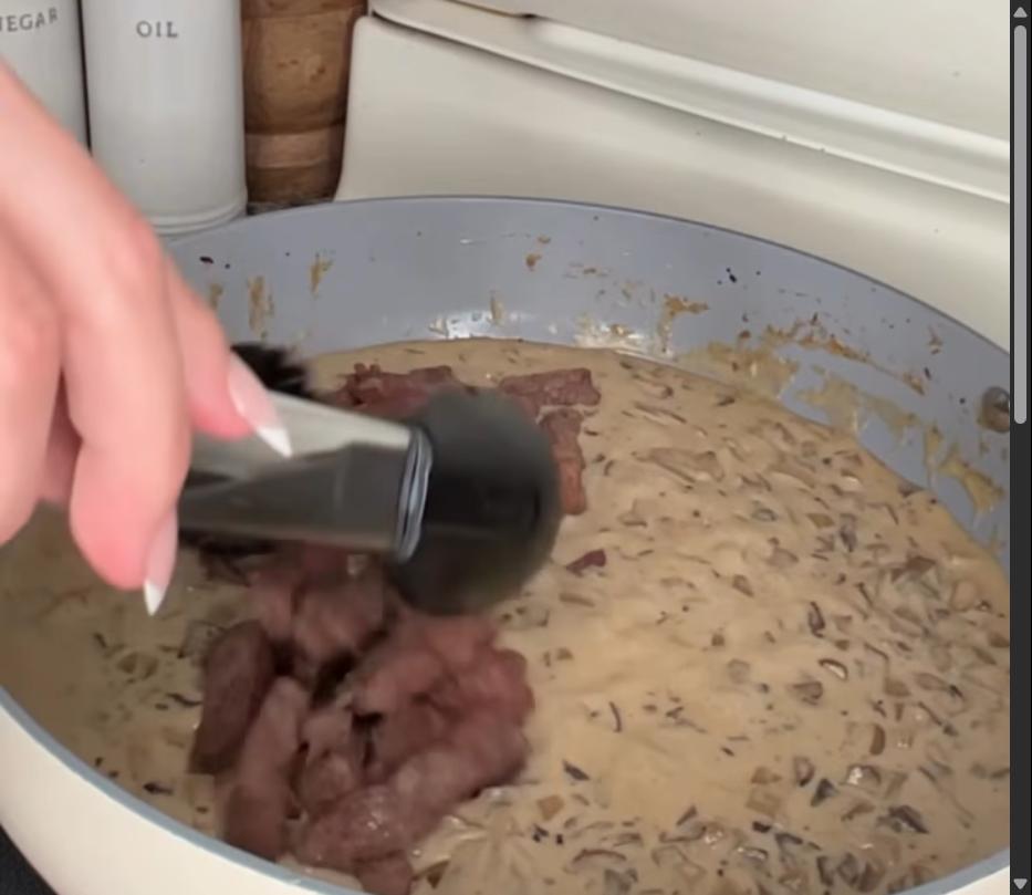 Step 1.1: Simmer the sauce until slightly thickened, then lower the heat