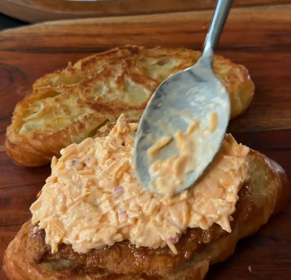 Step 1.1: Spread a thick layer of pimento cheese over the chicken so it gets slightly melty