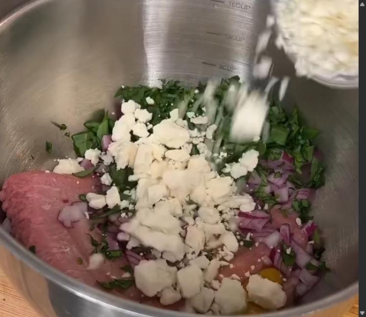 Step 2.1: Combine ground turkey, diced red onion, chopped spinach, egg, crumbled feta cheese, cumin, oregano, salt, and pepper in a large bowl