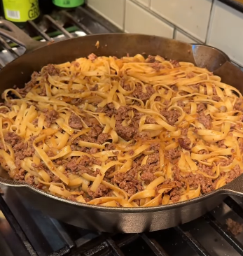 Step 6.1: Add the cooked noodles to the pan
