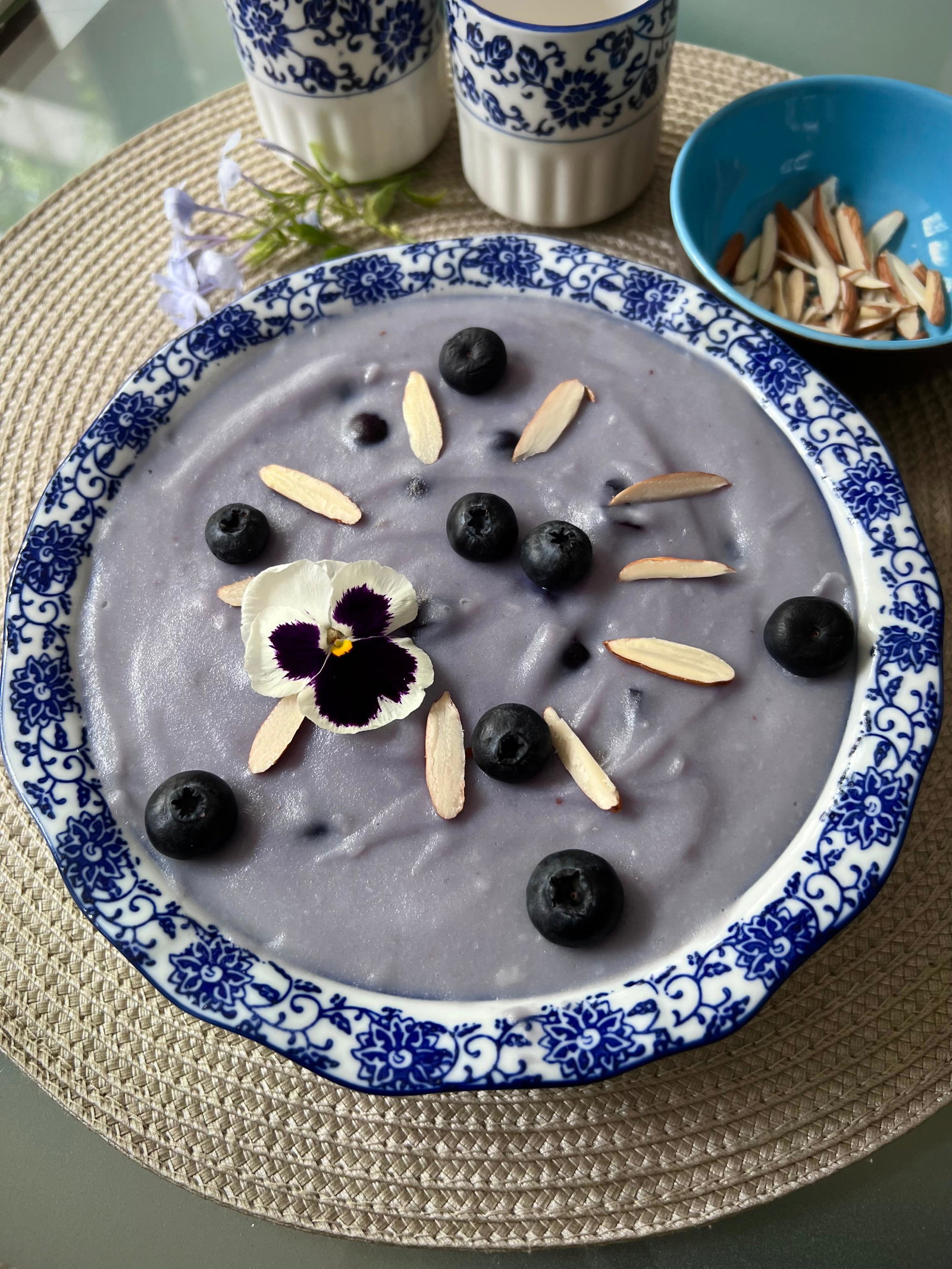 Step 1.3: Transfer to serving bowls, top with fresh blueberries and almond slivers