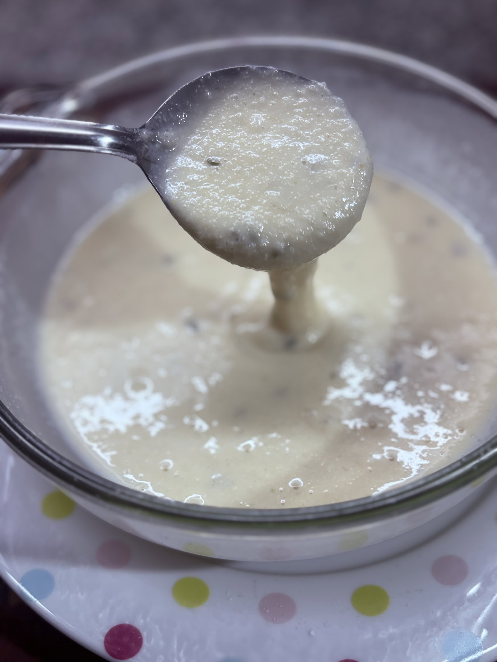 Step 1.1: Slowly pour in the warm milk while whisking