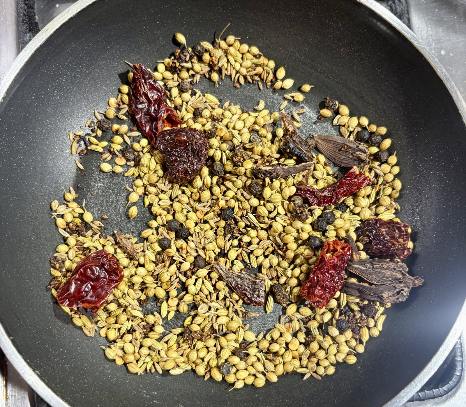 Step 1.1: Dry roast the spices until fragrant, stirring occasionally to prevent burning