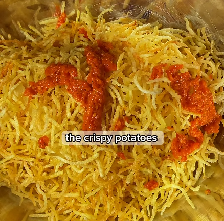 Step 3.1: Toss the crispy potato chips with the sambal until evenly coated