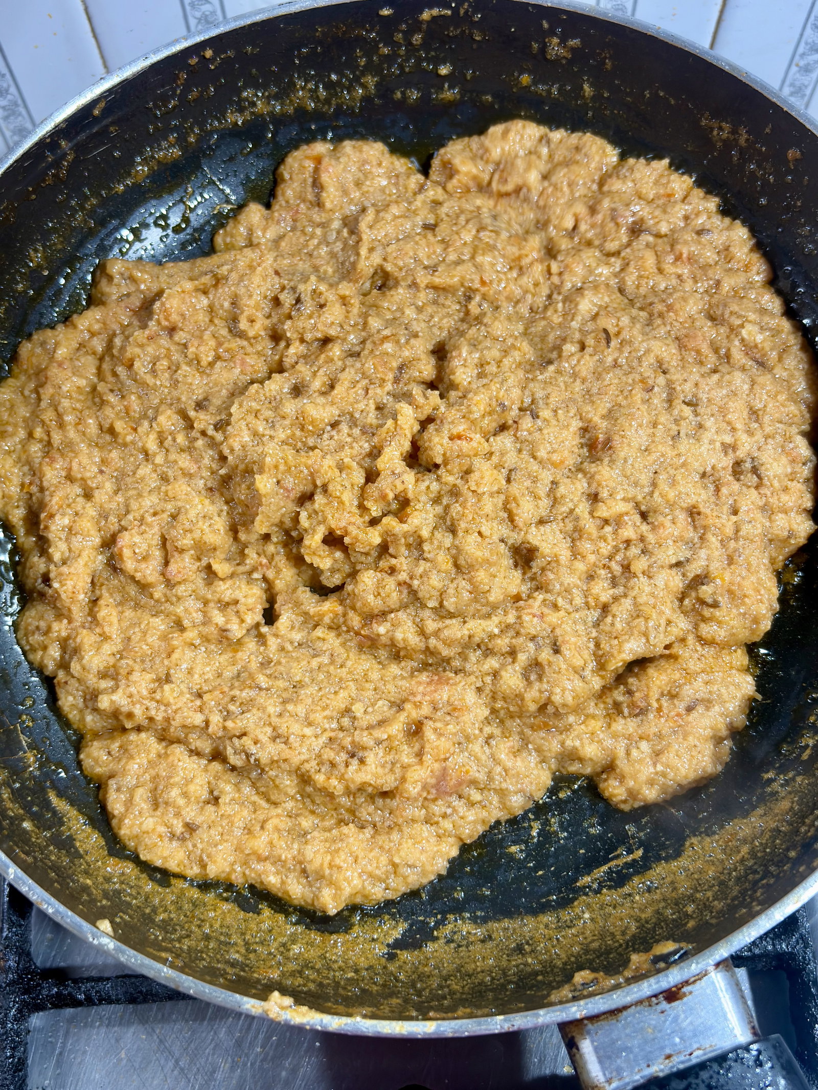 Step 4.2: Add the prepared barista paste and ½ cup of hot water to the pan