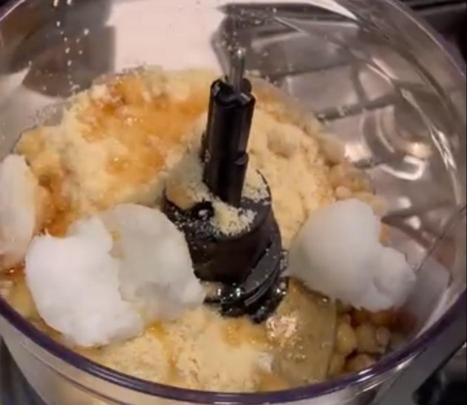 Step 1.1: Add garbanzo beans, almond flour, oats, coconut milk, eggs, maple syrup, coconut oil, vanilla extract, salt, baking soda, and baking powder into a blender or food processor and blend until smooth