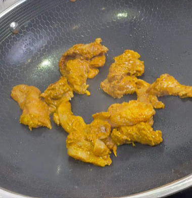 Step 1.1: Cook the marinated chicken in a skillet until golden and slightly charred