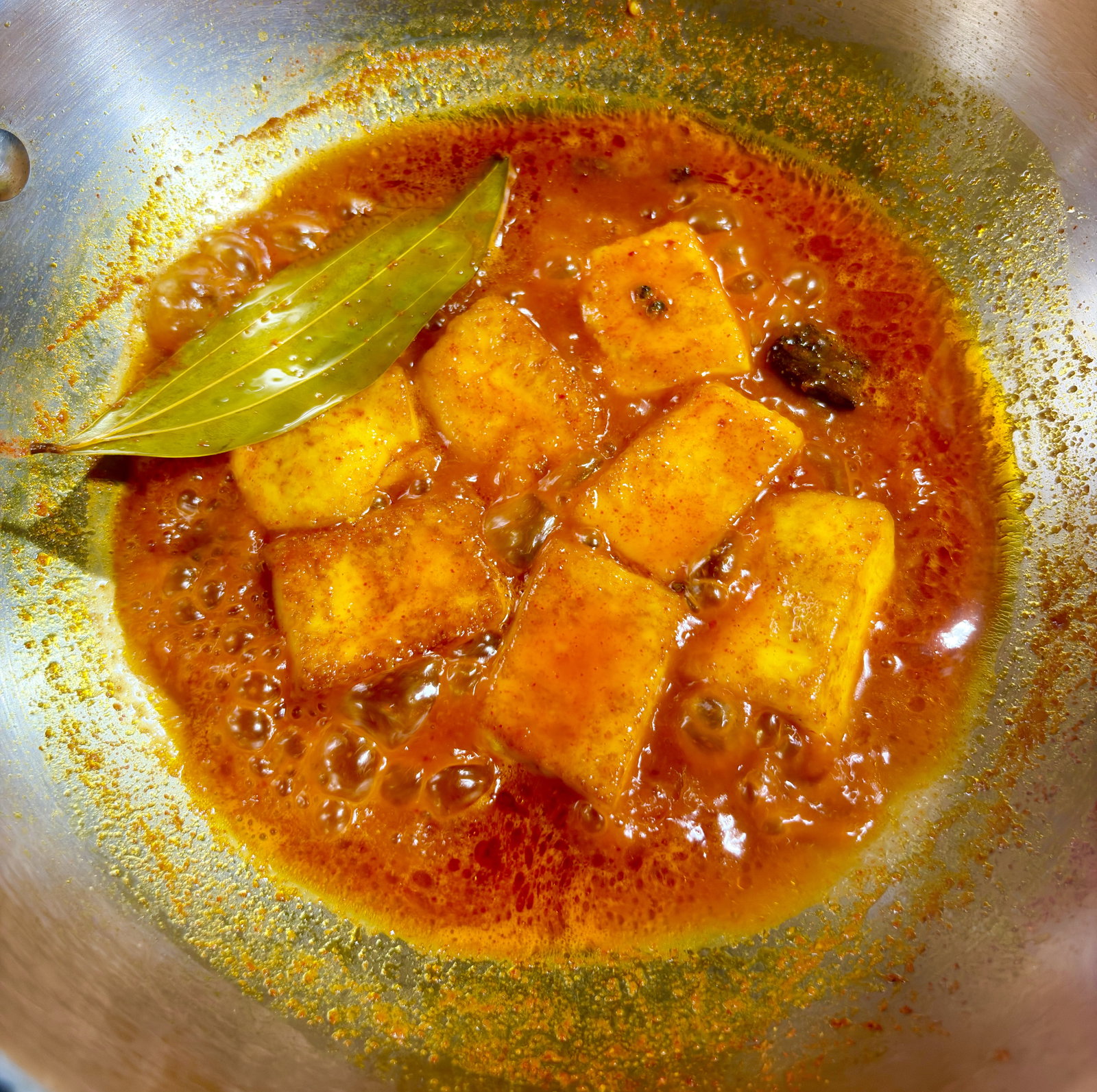 Step 5.1: Simmer for 2-3 minutes so the paneer absorbs the whole-spice flavours