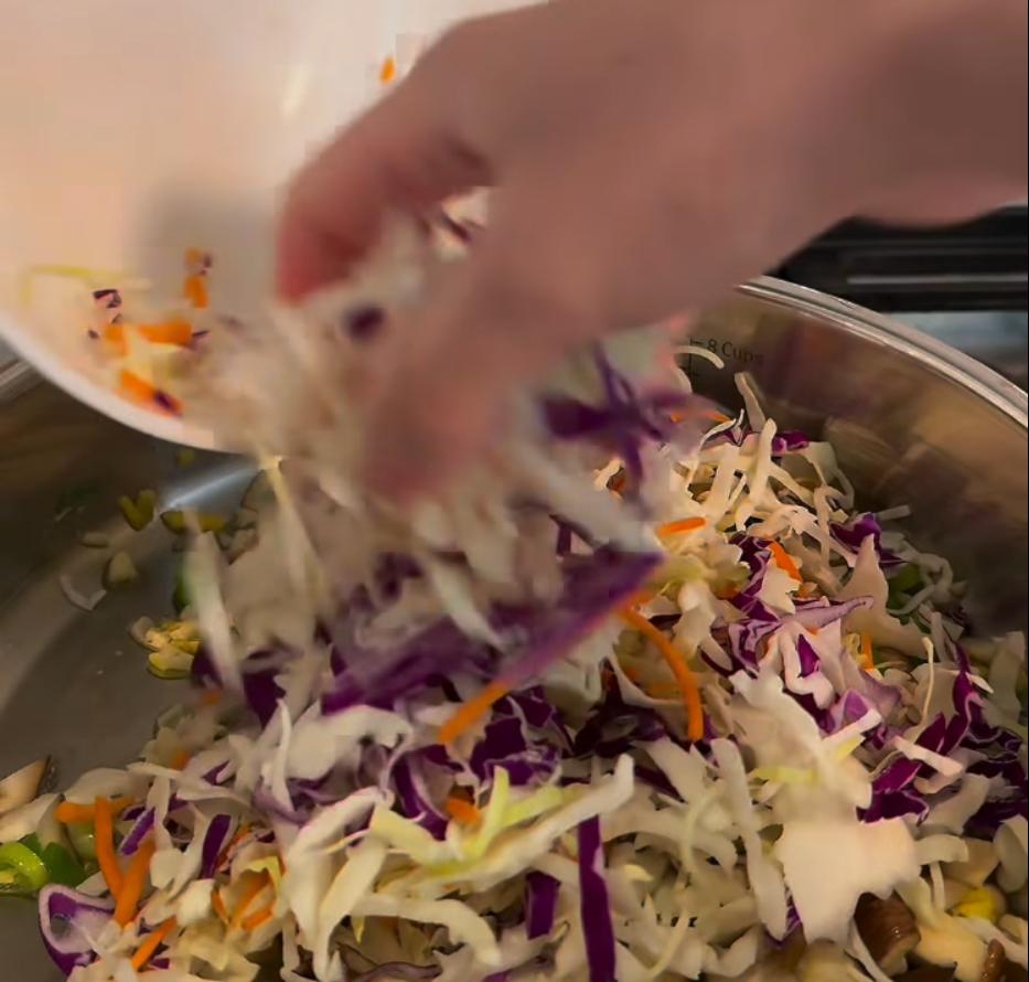 Step 1.1: Add shiitake mushrooms, green scallions, and coleslaw mix to the pan