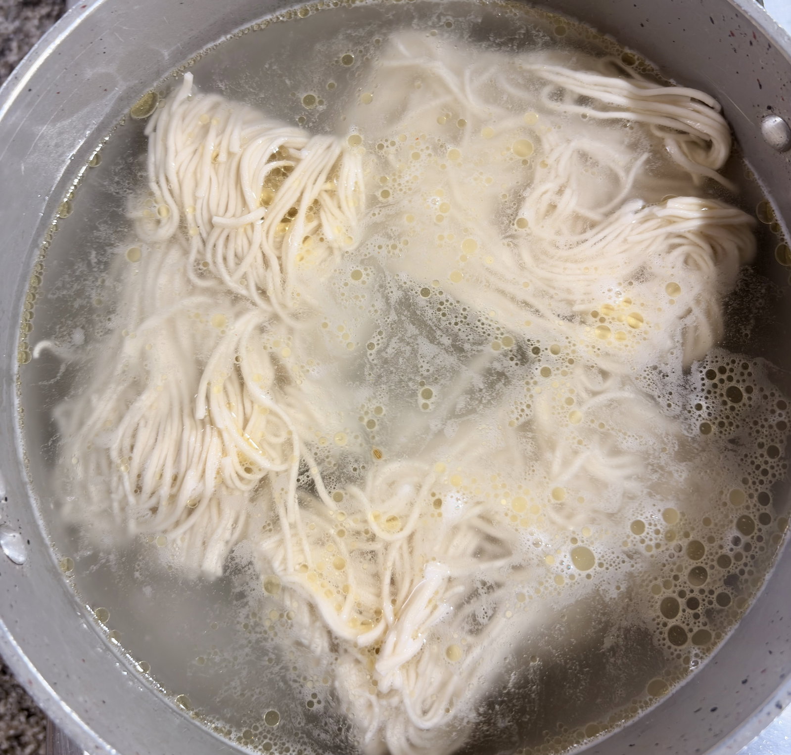 Step 2.1: Add the noodles and cook according to the package instructions until just tender