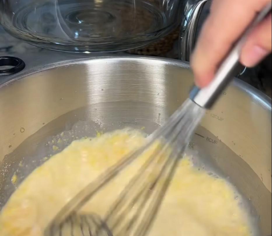 Step 1.1: Whisk together condensed milk, cold water, and vanilla pudding mix in a bowl until smooth