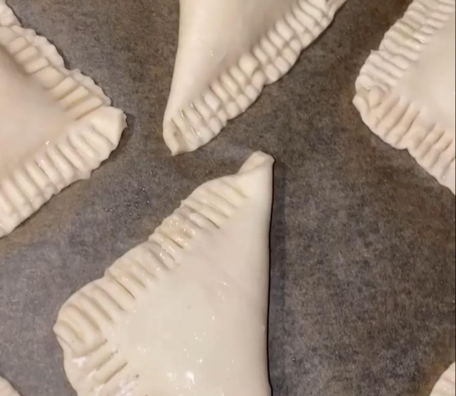 Step 1.1: Place the pasties on a lined baking tray and spray them with oil