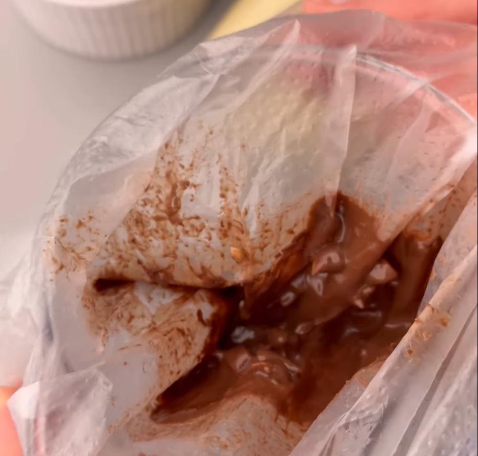 Step 1.1: Add the chopped nuts to the melted chocolate
