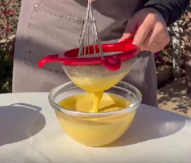 Step 1.1: Strain the curd through a sieve, pour into a jar, and chill until set