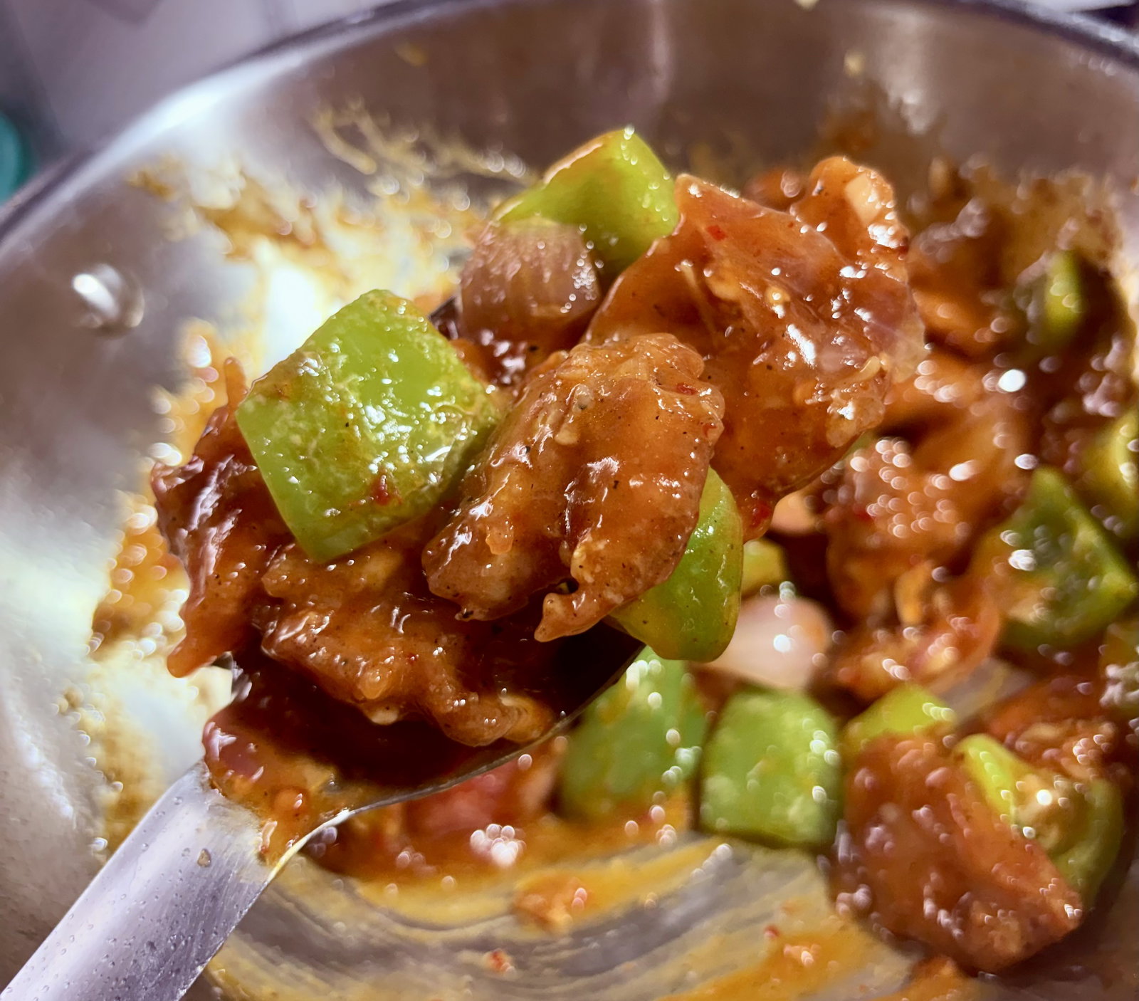 Step 3.2: Add the fried chicken and sautéed vegetables back into the wok