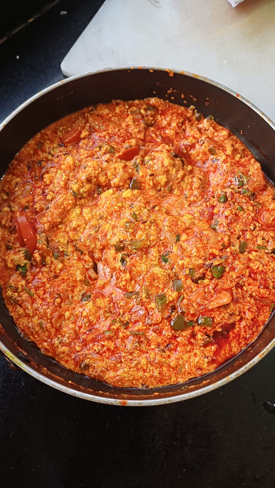 Step 1.3: Add grated paneer and toss gently to coat it in the masala