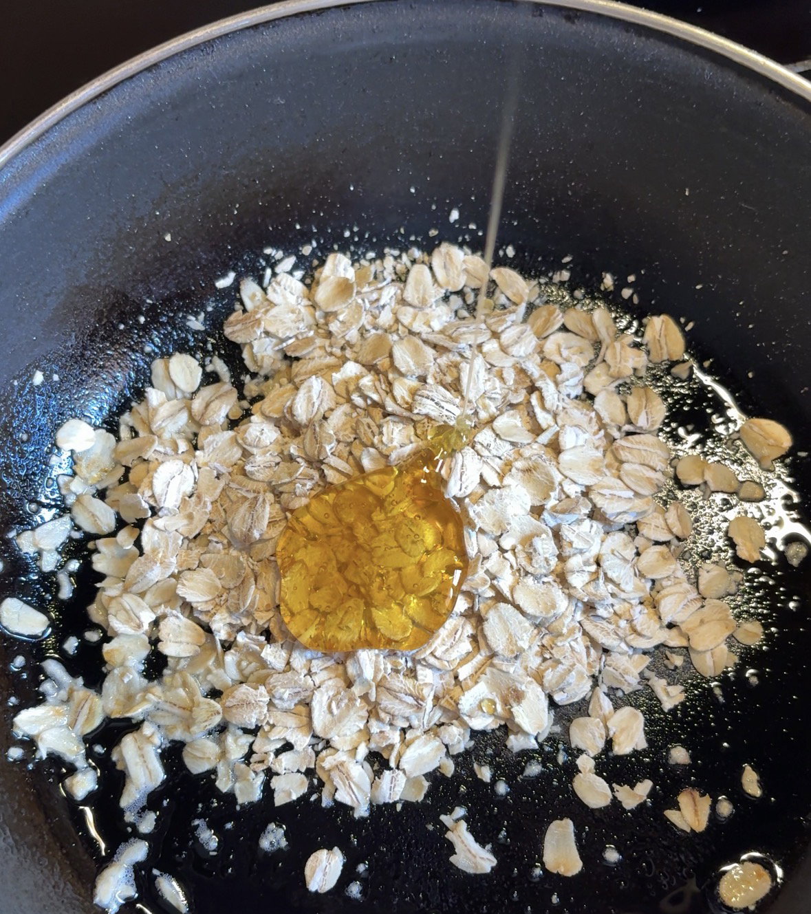 Step 1.1: Add the oats and maple syrup to a pan and cook until golden and crispy