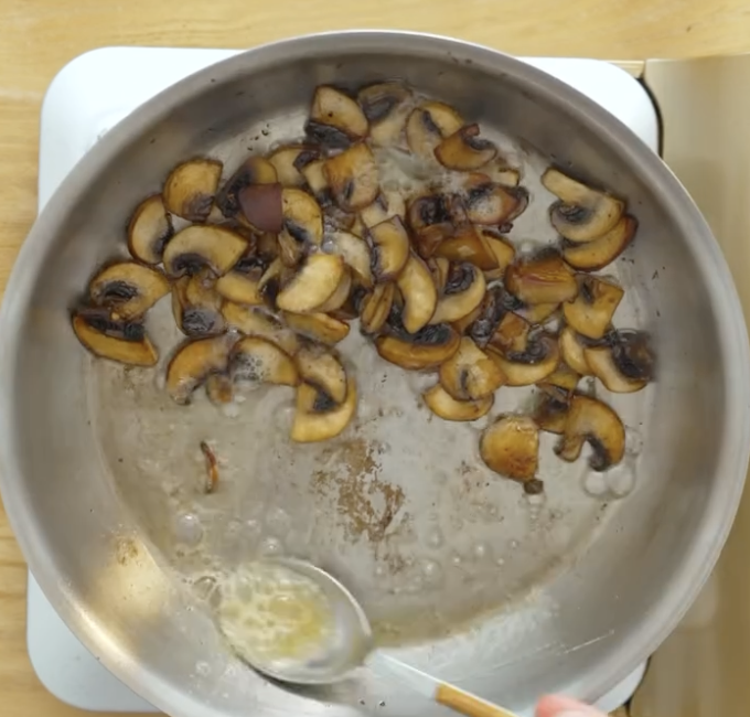 Step 1.1: Heat butter and olive oil in a hot pan, then sauté the mushrooms until lightly golden and their moisture has evaporated