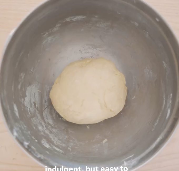 Step 1.1: Add the egg yolk and cold milk, then form the mixture into a dough