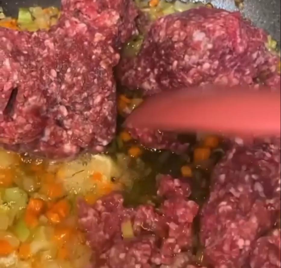 Step 1.1: Add the minced meat, canned tomatoes, and tomato paste, then season with salt, pepper, cayenne pepper, garlic powder, mixed herbs, and nutmeg to taste