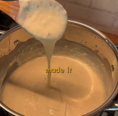 Step 2.1: Gradually add the milk while whisking continuously