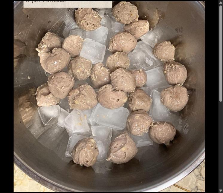 Step 1.1: Transfer the cooked meatballs to a bowl of ice water for a few minutes to set their texture