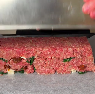 Step 3.1: Turn the layered mixture onto a lightly oiled baking sheet