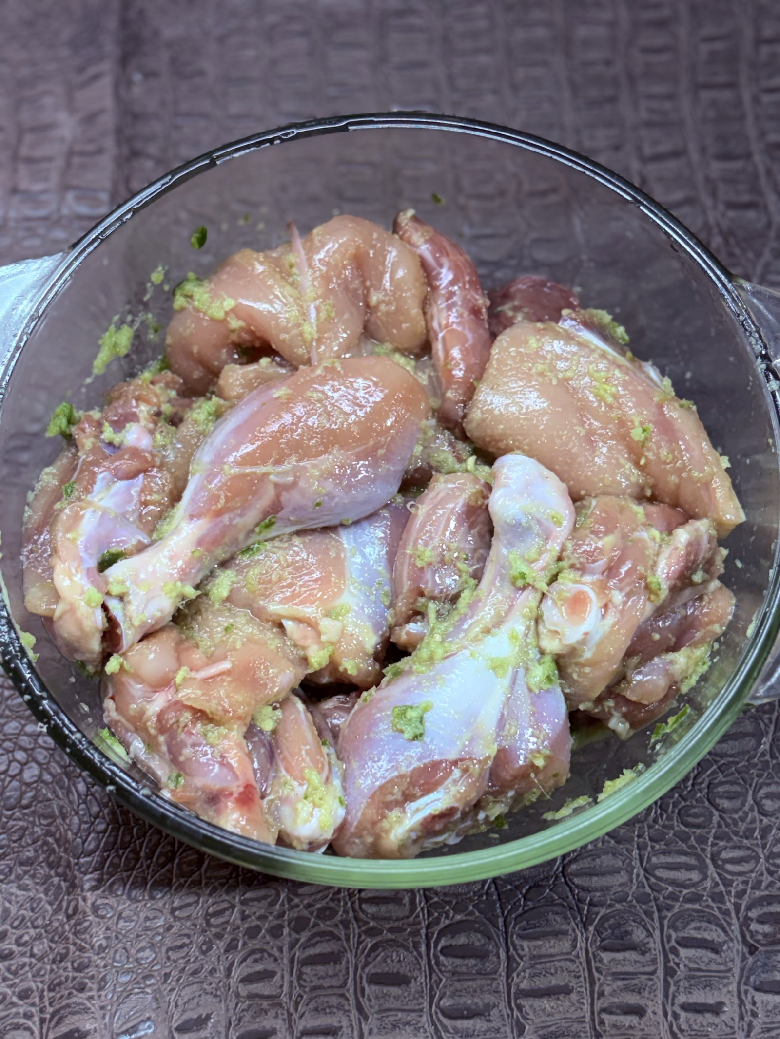 Step 1.2: In a large bowl, add the chicken pieces along with ginger-garlic paste, green chilli paste, and 1 teaspoon of salt