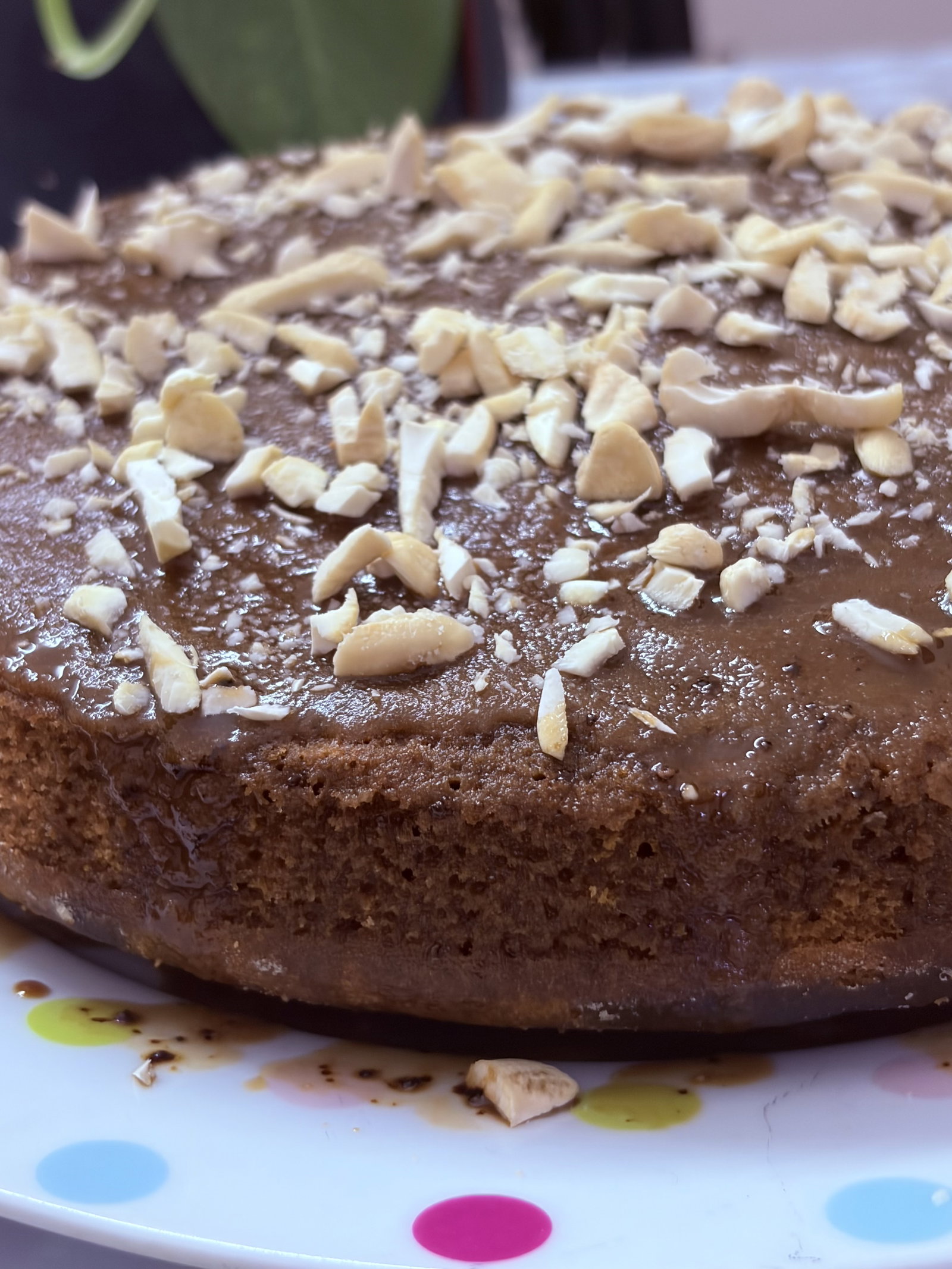 Step 5.3: Pour the icing over the cooled cake, spread and let it drip down the sides