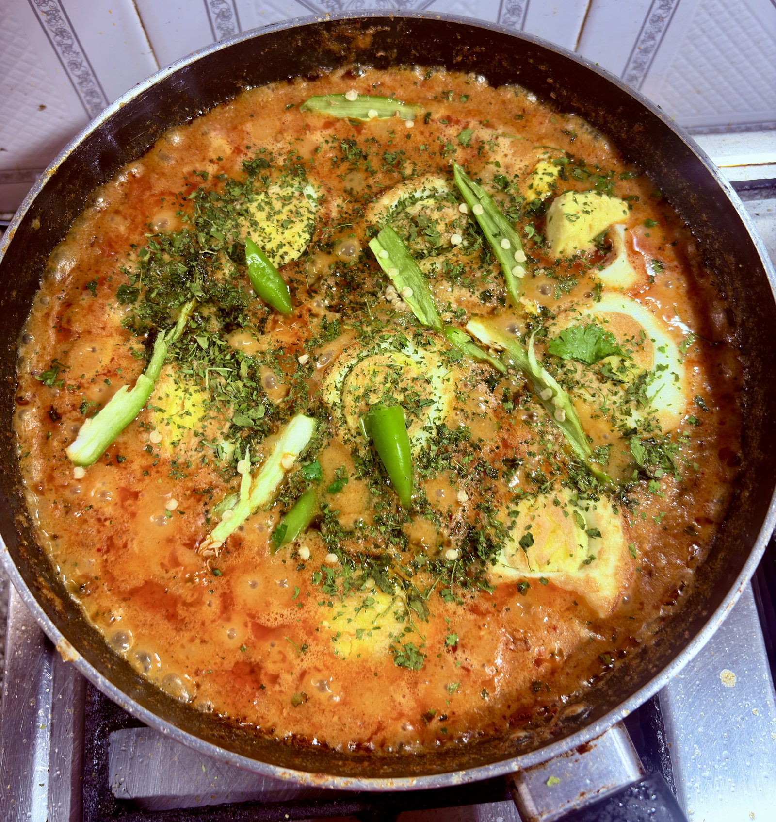 Step 6.1: Add crushed kasuri methi, slit green chillies, and ghee (if using)