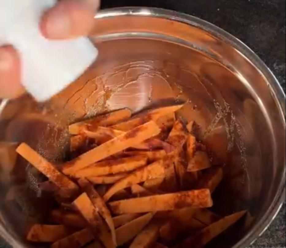Step 2.1: Toss fries with olive oil, garlic powder, onion powder, smoked paprika, salt, pepper, and corn starch