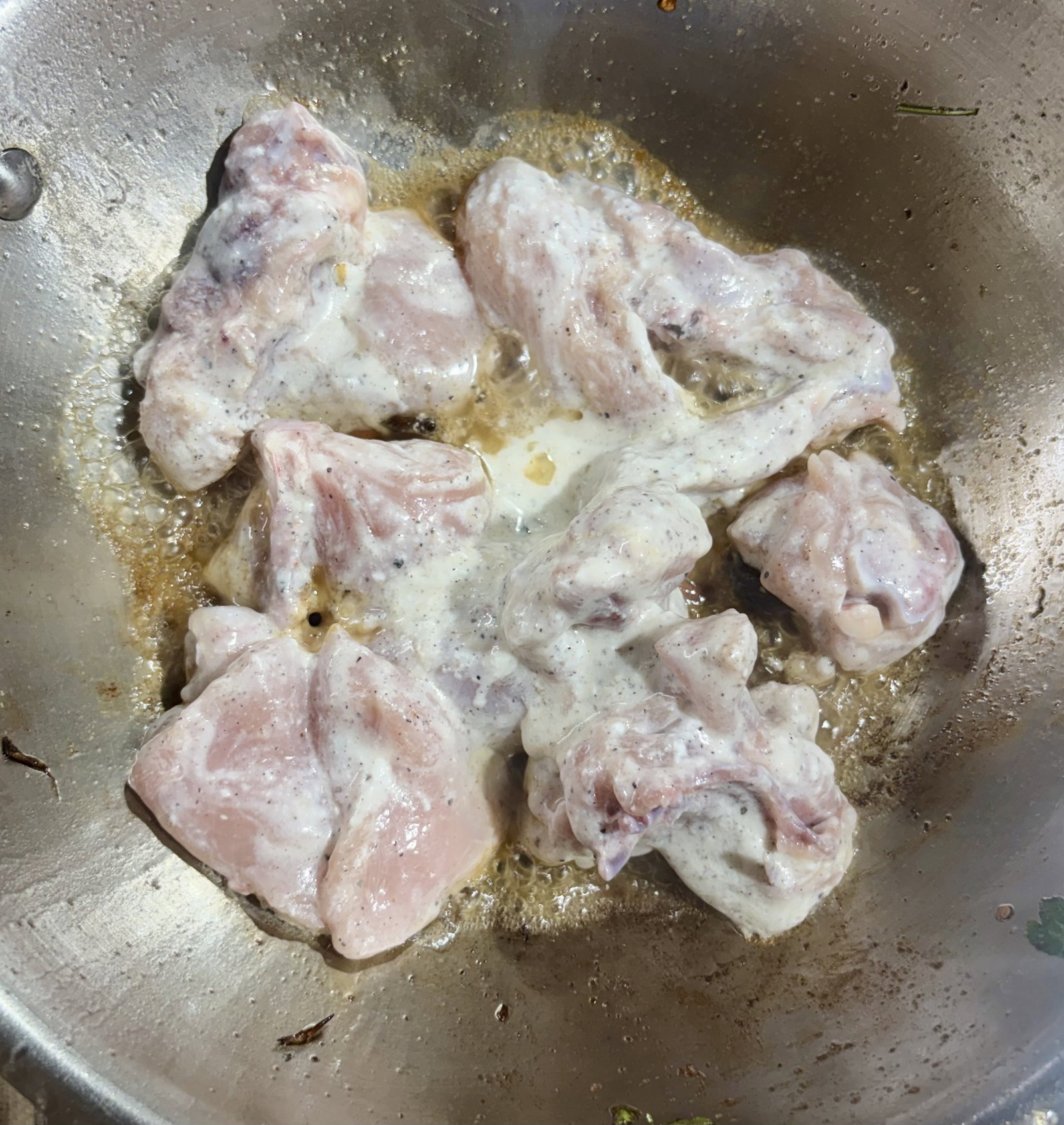 Step 3.1: Add the marinated chicken along with its yogurt marinade