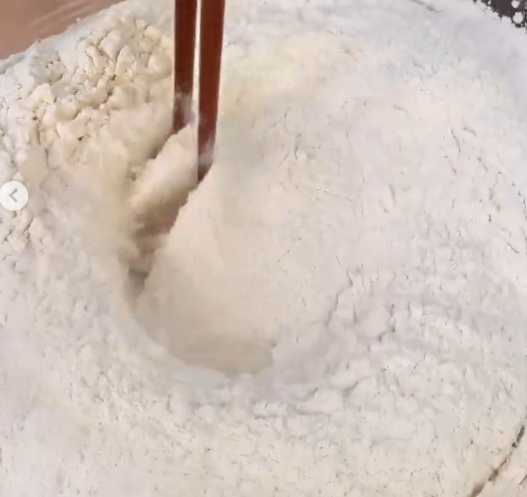 Step 1.1: Mix warm water, dry yeast, and sugar in a bowl
