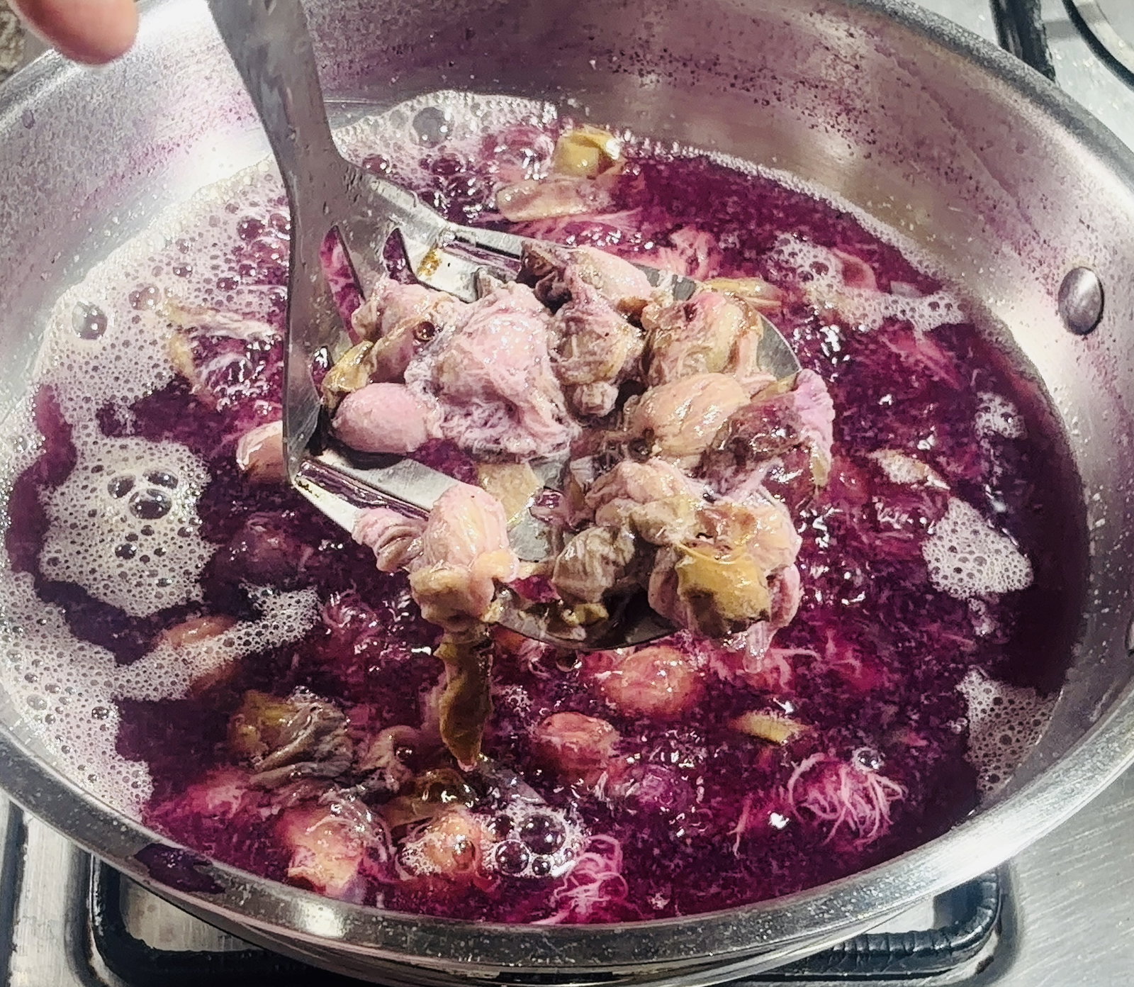 Step 1.1: Continue cooking on medium heat for about 12 to 15 minutes until the jamun becomes very soft and releases its vibrant purple colour and flavour into the water