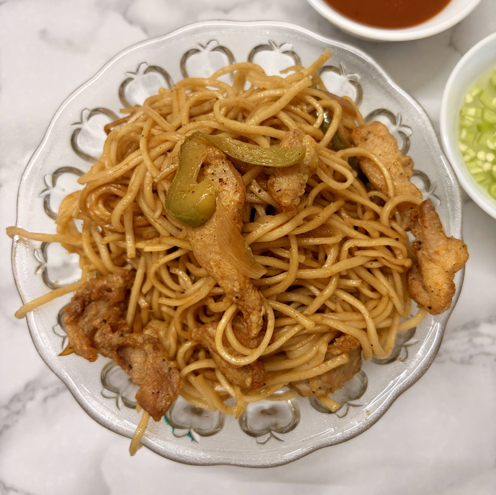 Step 3.2: Add the fried chicken back into the pan and toss everything together for another 1–2 minutes until sizzling hot