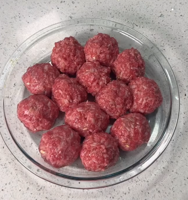 Step 1.1: Form the mixture into meatballs and place them in a baking dish