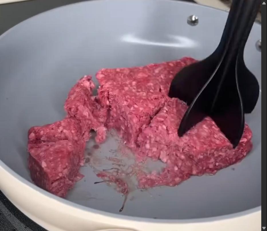 Step 2.1: Brown ground beef in a large sauté pan until cooked through