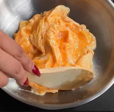 Step 1.1: When the bottom starts to cook slightly, gently fold the eggs inward like a tornado