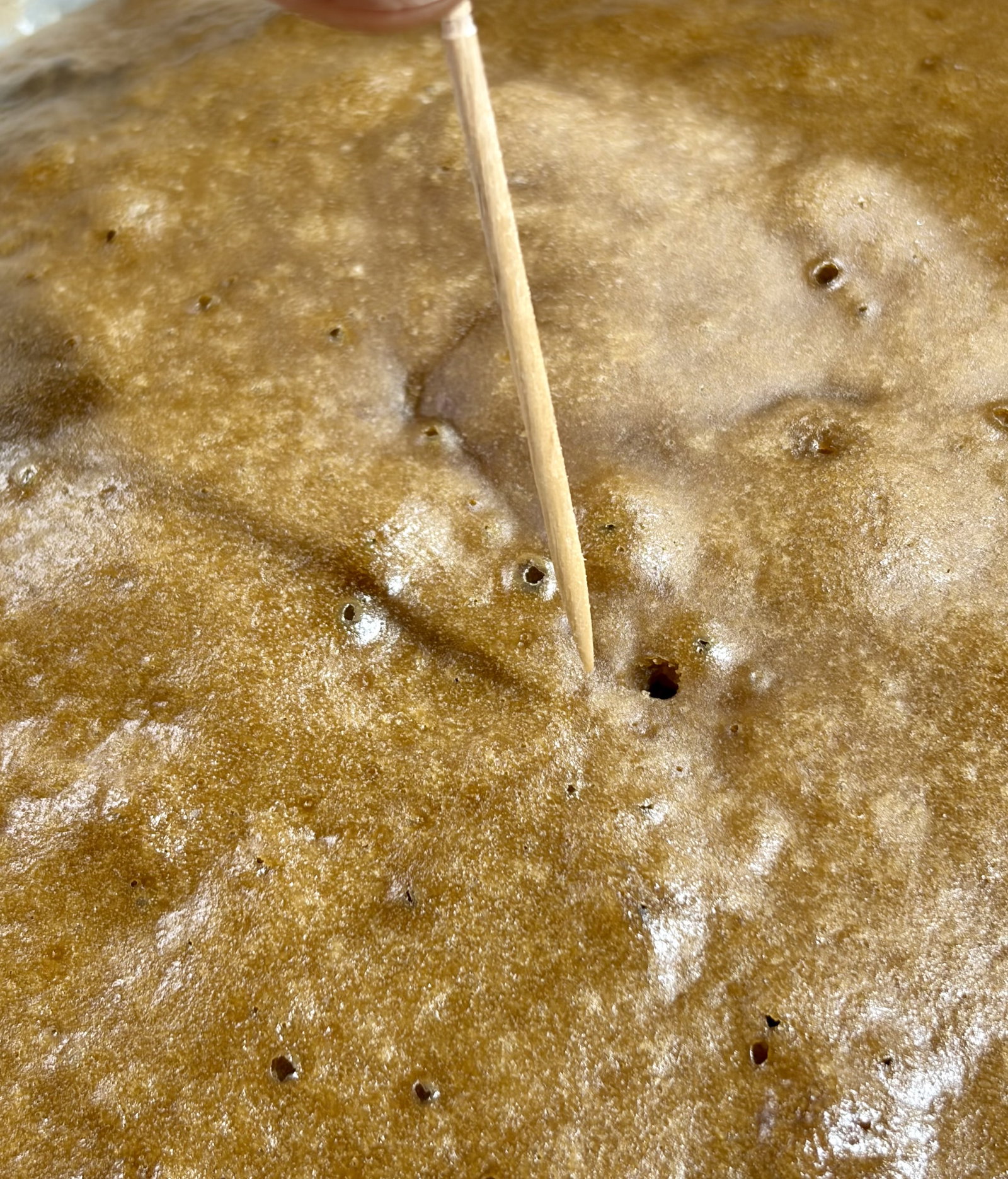 Step 4.1: Insert a toothpick into the centre of the cake